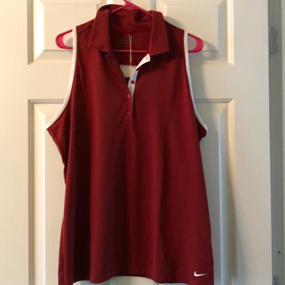 Red golf shirt.